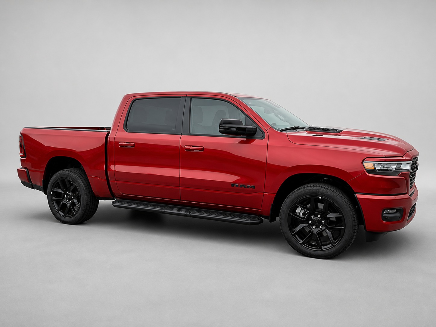 Red RAM 1500 passenger-side exterior
